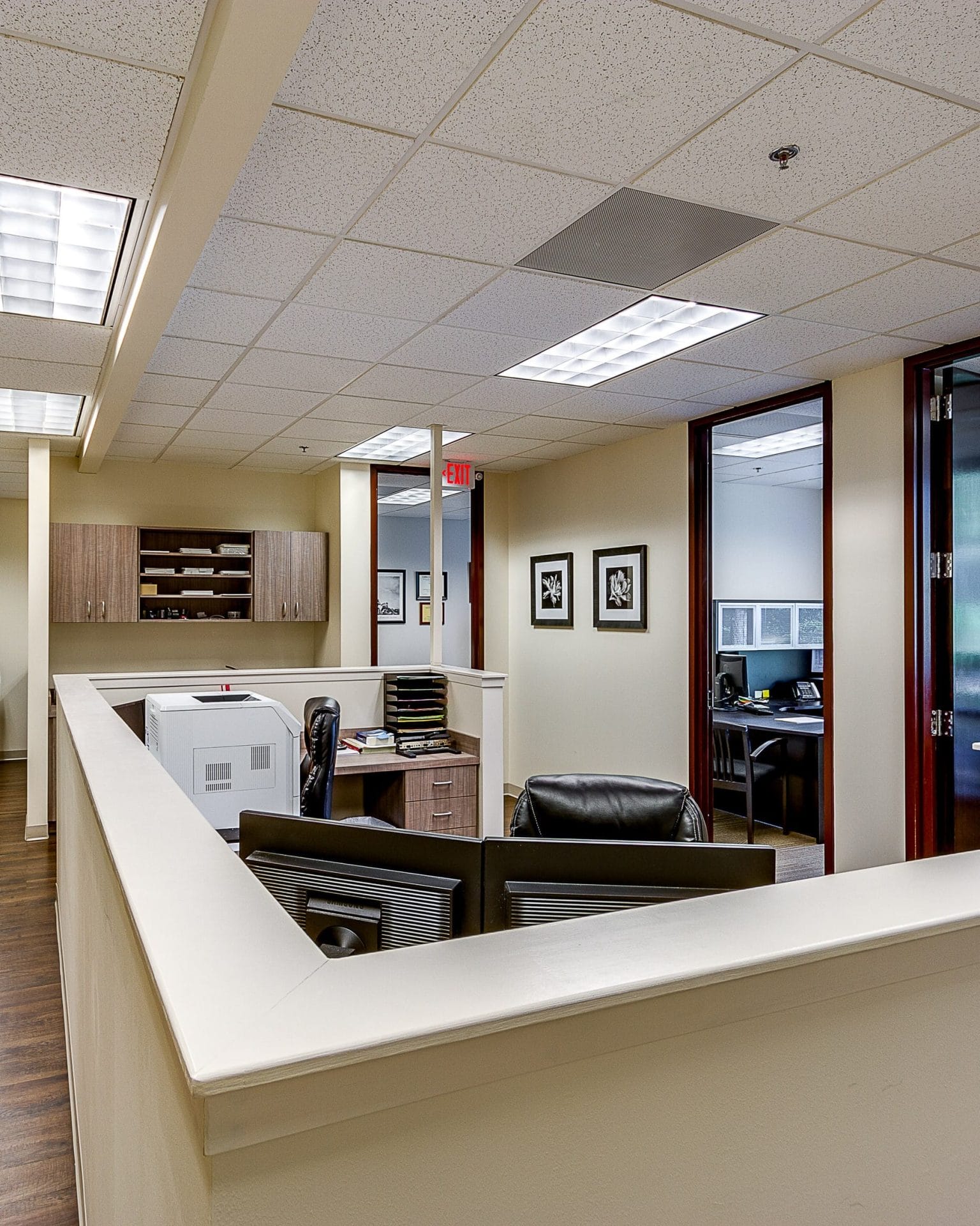 Modern corporate office construction Jacksonville featuring a large glass facade and sleek architectural design.