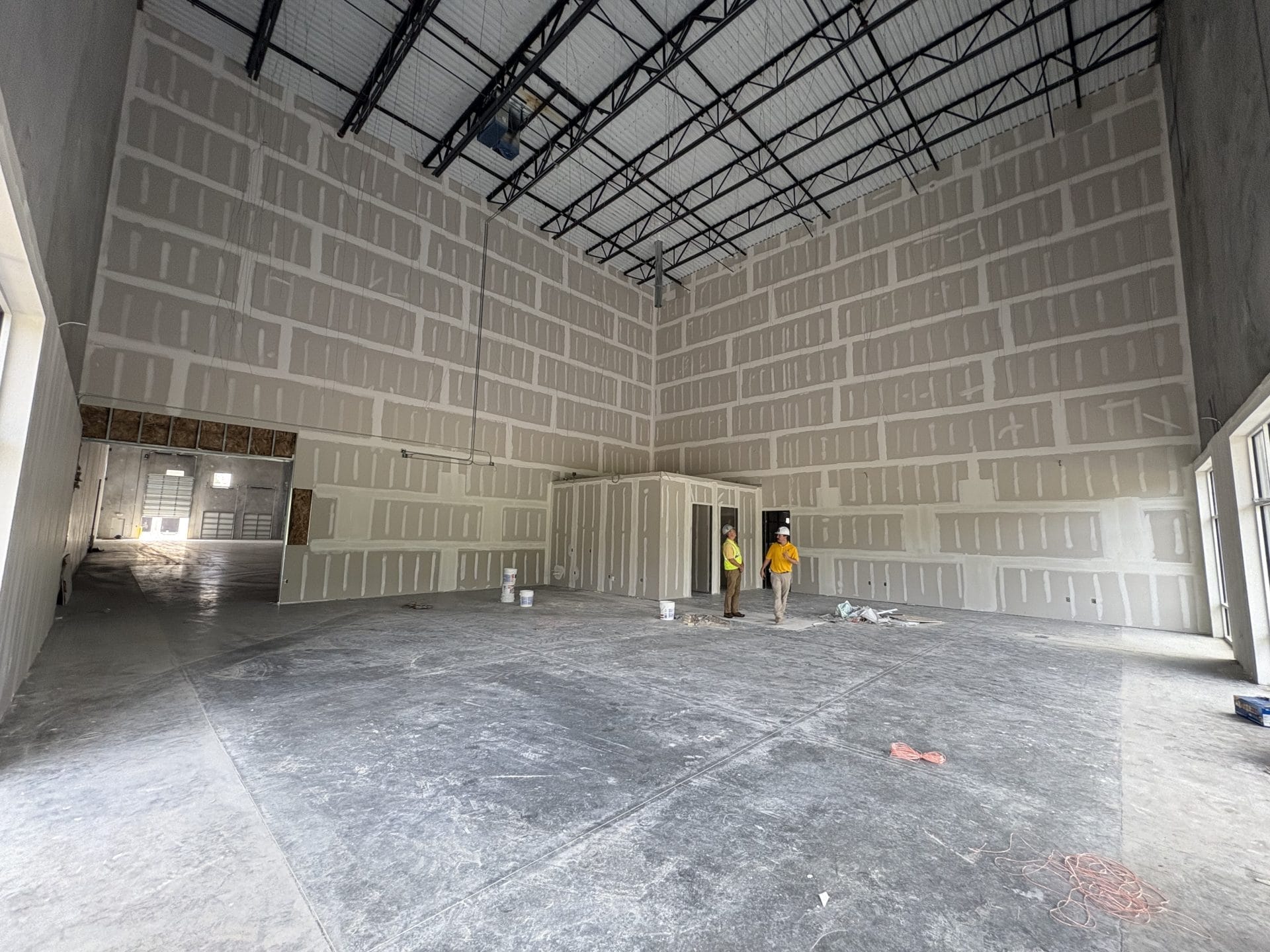 warehouse construction Jacksonville FL - A construction site in Jacksonville, FL, showcasing warehouse construction with cran